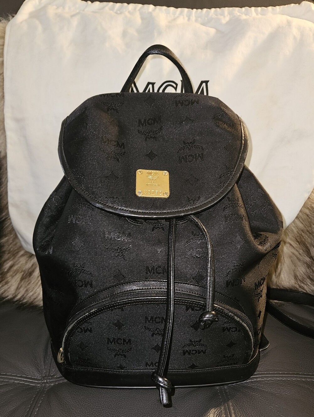 MCM Black Logo Drawstring Backpack with Gold Plaque